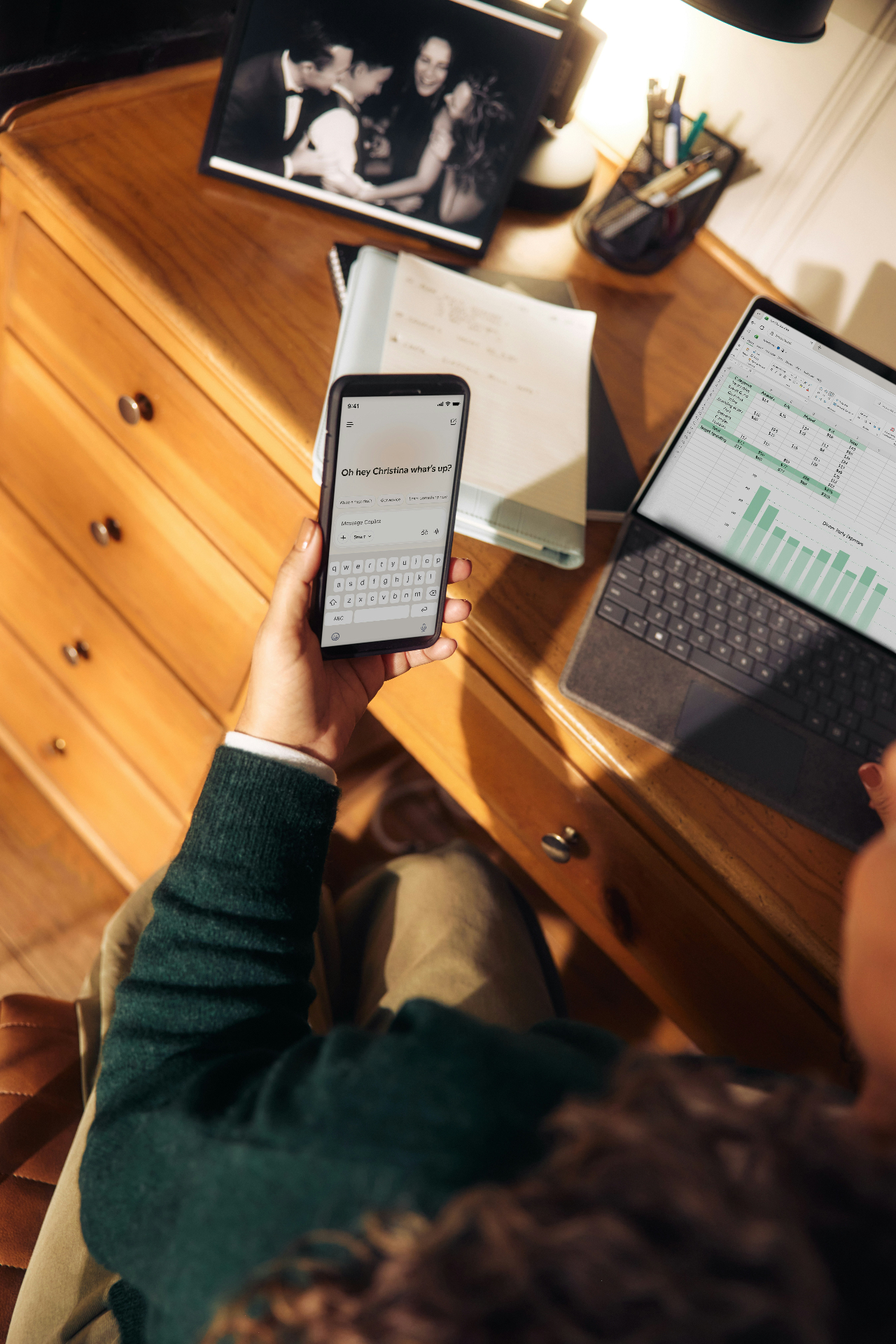 Arizona homeowner booking a handyman from her phone while reviewing her schedule